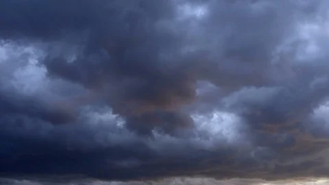 Time lapse of fast moving dark clouds 스톡 동영상 73667133