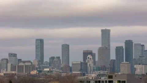 Time lapse of fast moving storm clouds over the Toronto skyline Stock Footage 151220434