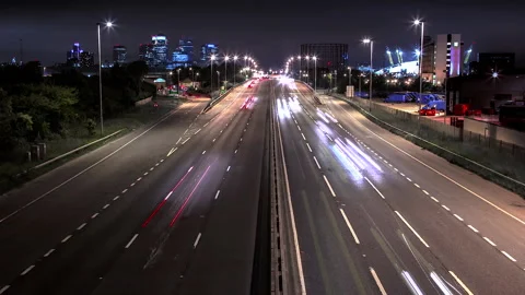 Time-lapse of fast road into city Stock Footage 141587614