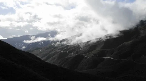 Time lapse of fast storm clouds clearing over the Santa Ynez Mountains Stock Footage 1019568