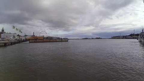 Time lapse - Ferris Wheel, Bay and Grey Clouds Stock Footage 79850656