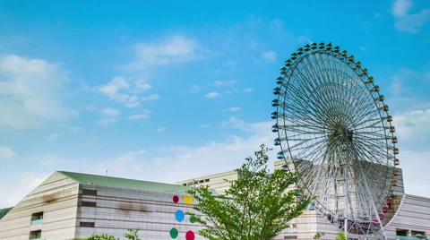 Time Lapse - Ferris Wheel with Nice Cloudscape Stock Footage 64581694