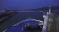 Time Lapse Ferry Boat Leaving Seaport Dock At Night 4k or 4k+ Resolution