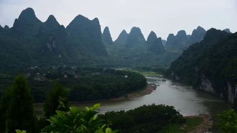 Time lapse of ferry boats going up the Li River in Guilin China Stock Footage 73270775