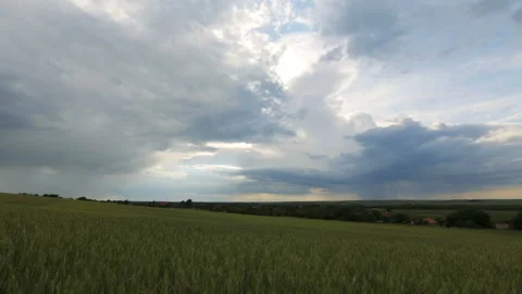 Time Lapse of a field and clouds on a windy day Stock-Footage 131053798