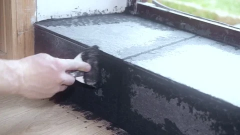 Time lapse of filling gaps between tiles with grout Stock Footage 75061180