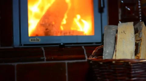 Time lapse of fire in fireplace with fire wood in punnet. Stock Footage 44936374