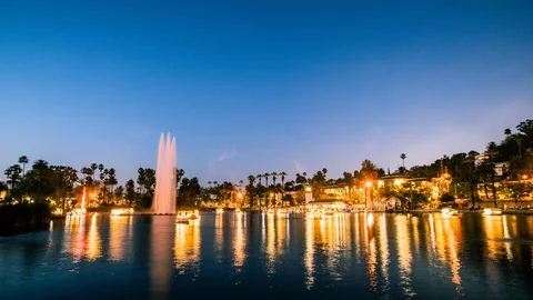 TIme Lapse - Fireworks explode over Lake on July 4th with Boats in the Lake Stock Footage 118884576