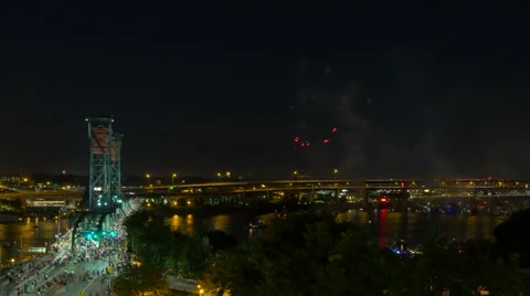 Time Lapse of Fireworks on Willamette River with Hawthorne Bridge in Portland OR Stock Footage 52002507