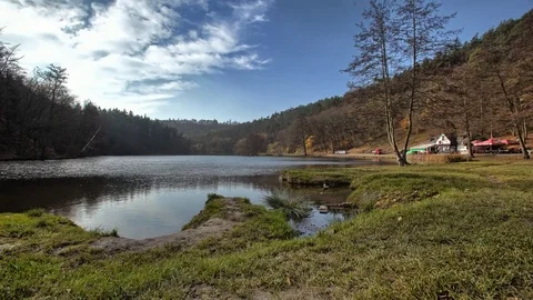 Time lapse with fishpond and cloudy sky Video stock 72729388