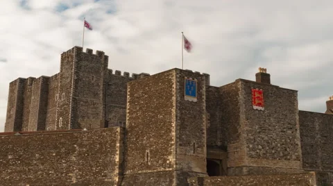 Time-lapse of flags blowing over Dover Castle Stock Footage 52234483