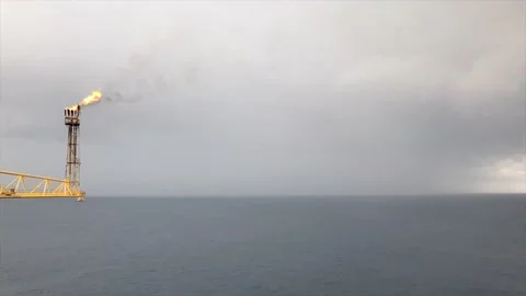 Time lapse flare burning bridge of oil and gas platform or offshore platform wit Stock Footage 231020673