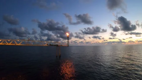 Time lapse of flare burning bridge of oil and gas platform or offshore platform  Stock Footage 235587030