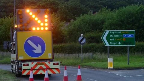 Time lapse flashing warning lights at roadworks in leeds at night uk Stock Footage 202126395