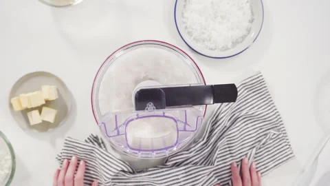 Time lapse. Flat lay. Mixing ingredients in a food processor to prepare homemade Stock Footage 237378221