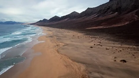 Time lapse flight over desert beach on Fuerteventura island, Spain Stock Footage 82259344