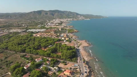 Time-lapse flight over a Spanish coast on the Mediterranean with a coastal road Video stock 301928618