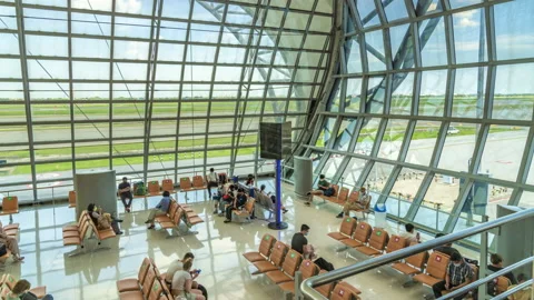 Time lapse of flight passengers waiting to board their plane Stock Footage 200207273