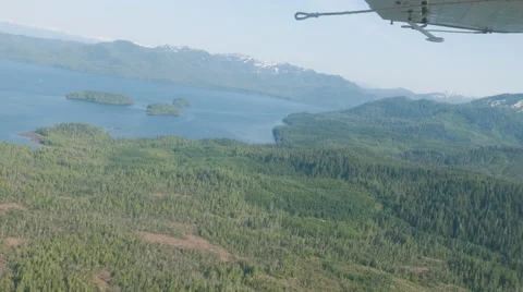Time-lapse from a float plane flying and landing in the water at Ketchikan, AK. Stock Footage 52219233