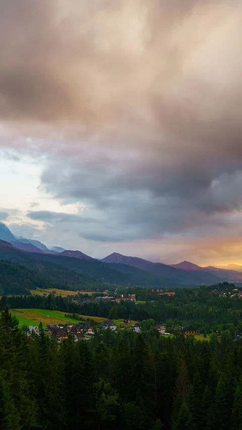 Time-Lapse of Floating Clouds at Dusk: Tatra Ranges in Poland Stock Footage 309658133