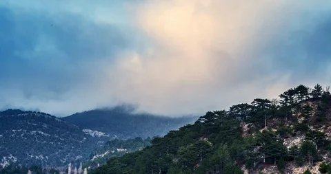 Time-lapse floating clouds over the mountains Stock Footage 86450956