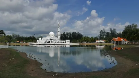 Time lapse of a Floating Mosque by the lake side in bright day Stock Footage 62309691