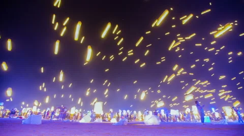 Time Lapse - Floating Sky Lanterns Against the Sky with Blue Tone Stock Footage 56594417
