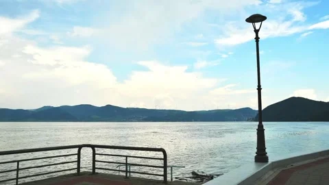 Time lapse of flowing Danube river and mountains viewed from a shore Stock Footage 263145056