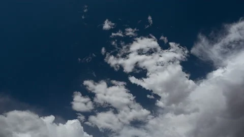 Time lapse of fluffy cumulus clouds forming Video stock 238353529