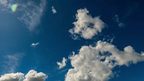 Time Lapse Fluffy Cumulus Clouds and Deep Dark Blue Sky Stock Footage 278811574