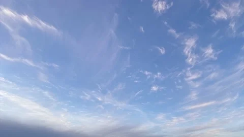 Time lapse of fluffy soft clouds slow moving on the blue sky Stock-Footage 227545463