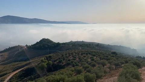 Time lapse: Fog and clouds build at the foot-hills of the Sierra Lujar Mountains Stock Footage 118964713
