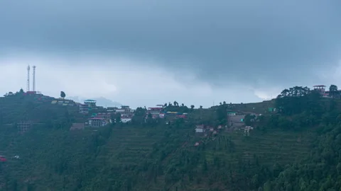 Time-Lapse of Fog over Dhanolti Village Nestled in the Mountains of Uttarakhand. Stock Footage 263343953