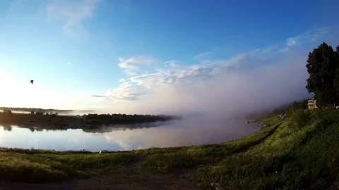 Time lapse, fog over the river, sunrise Stock Footage 77673192