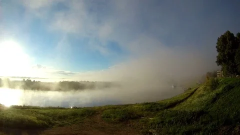 Time lapse, fog over the river, sunrise Stock Footage 77673544