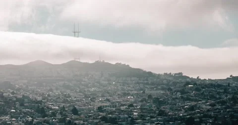 Time lapse of the fog rolling in to downtown San Francisco Stock Footage