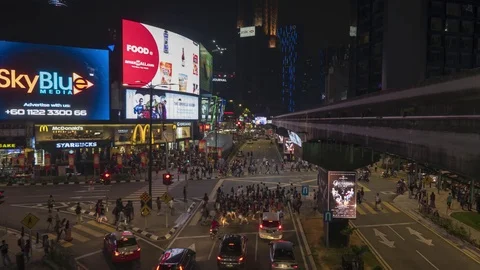 Time lapse footage of Bukit Bintang landmark, public transportation Stock Footage 105293914