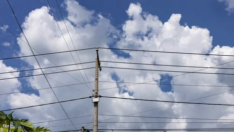 The time lapse footage of clouds sky with utility pole. Stock Footage 110657966