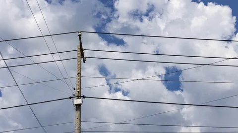 The time lapse footage of clouds sky with utility pole. Stock Footage 110658288