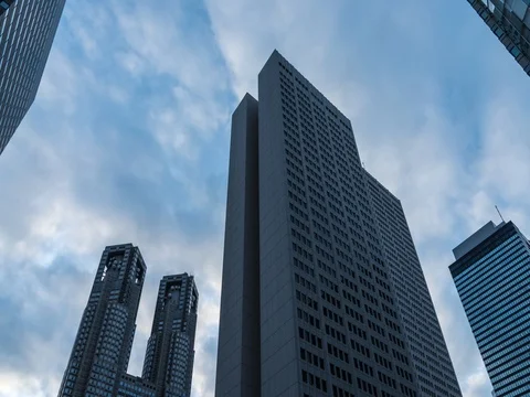 Time-lapse footage of the cloudy sky over Shinjuku business area before sunset Stock Footage 76387623