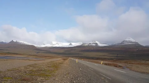 Time-lapse footage of dynamic clouds above Iceland's snow-covered highlands. Stock Footage 255117376