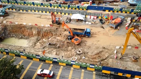 Time lapse footage: The excavator is loading the soil onto a truck Stock Footage 108349815