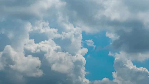 Time-lapse Footage of Fluffy White Clouds Drifting After Rain Clears Up Stock Footage 339308309