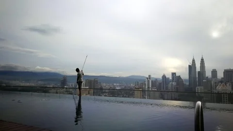 Time lapse footage man working cleaning the swimming pool Stock Footage 86892931