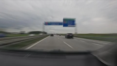 Time lapse footage from a moving car showing road traffic ahead and passing.. Stock Footage 345604885