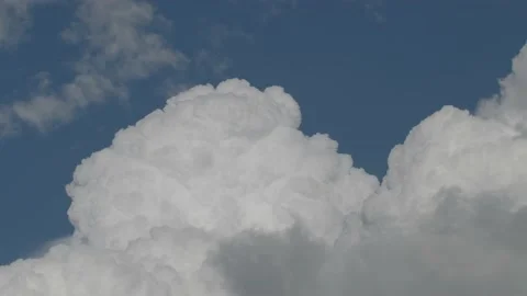 Time lapse footage of thunderstorm clouds building Stock Footage 209778850