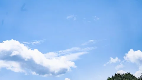 Time-lapse Footage of White Clouds Blown by Wind Stock-Footage 339308763