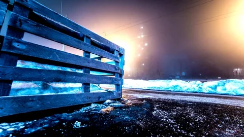 Time lapse. foreground pallet construction. Tram and snow. long exposure Stock Footage 72163875