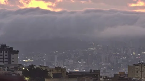 Time lapse form rain clouds over Belo Horizonte city, Brazil, during sunrise  Stock Footage 163669041