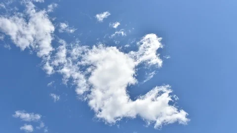 Time Lapse, Formation and rapid movement of white clouds (Cumulus clouds) fro Stock Footage 85611428